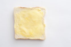 Buttered white bread