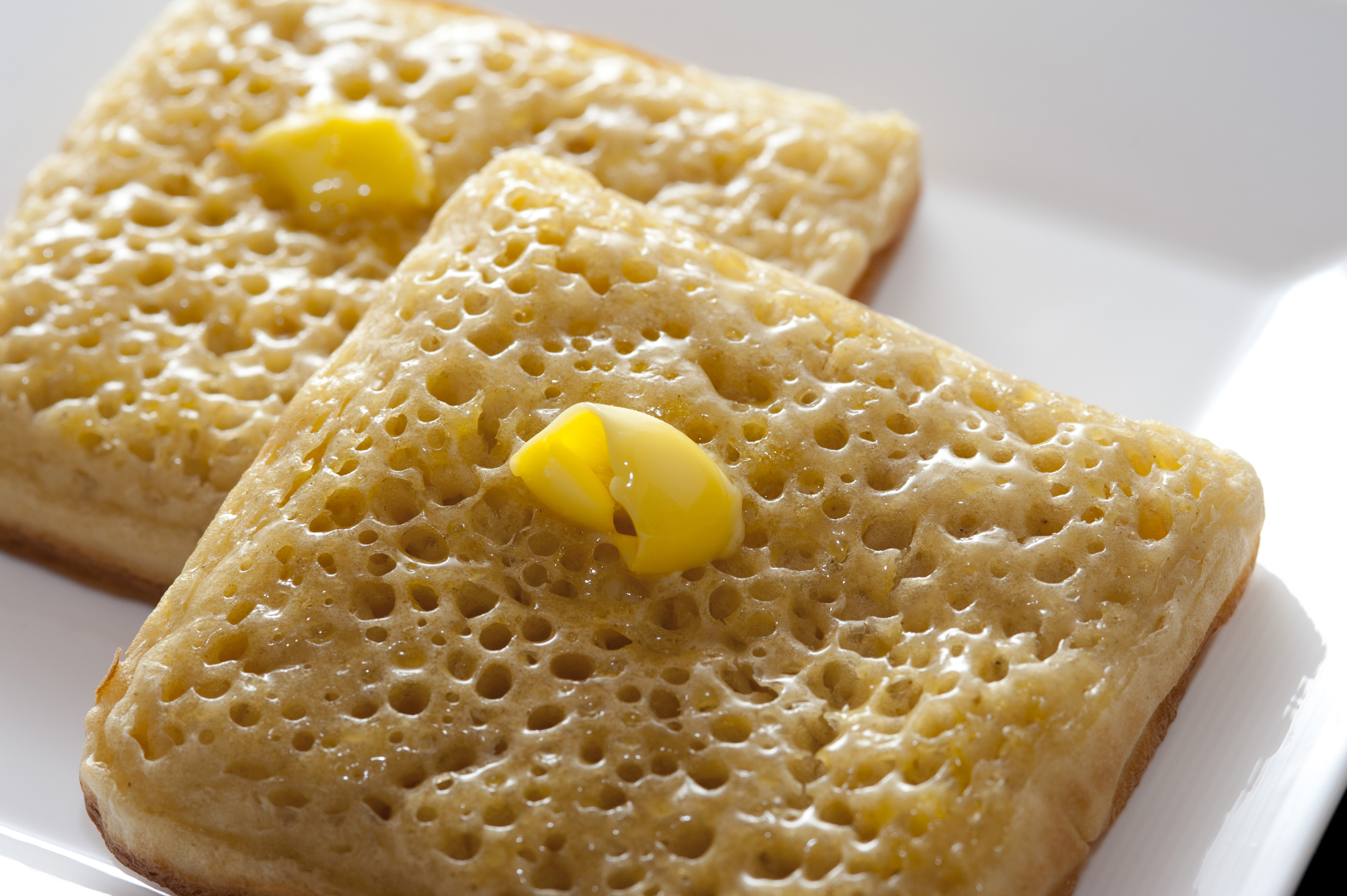 Hot toasted fresh square crumpets Free Stock Image