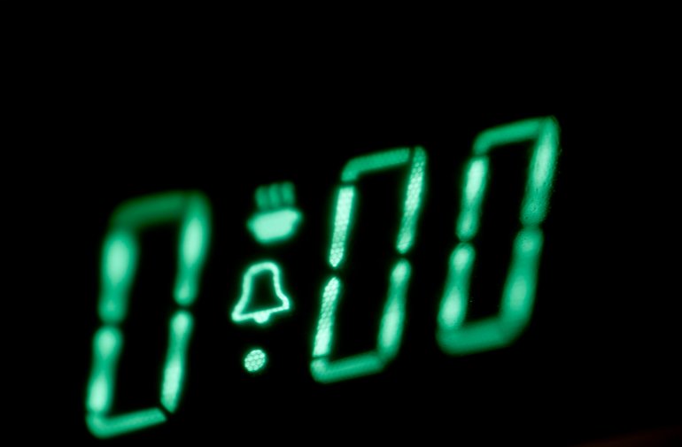 Illuminated digital oven timer showing zero cooking time remaining for the contents of the oven