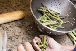 dicing fresh green asparagus tips