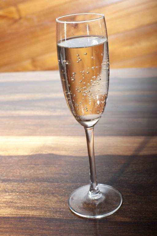 Elegant flute of sparkling wine or champagne to celebrate a special event at a party or romantic evening