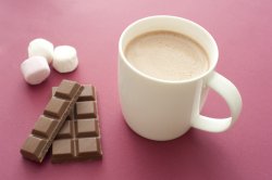 Delicious hot chocolate drink with ingredients
