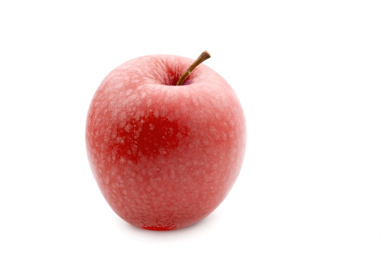 Single healthy juicy fresh red apple with a stalk over a white background