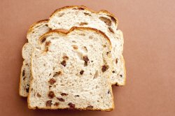 Photo of three slices of bread with raisin