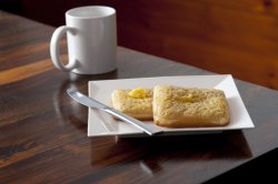 Coffee mug with two crumpets