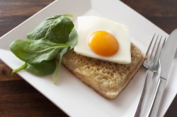 square egg sunny side up on a crumpet
