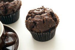 double chocolate muffins on white table