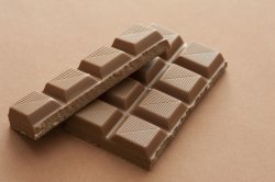 Squares of milk chocolate from a candy bar