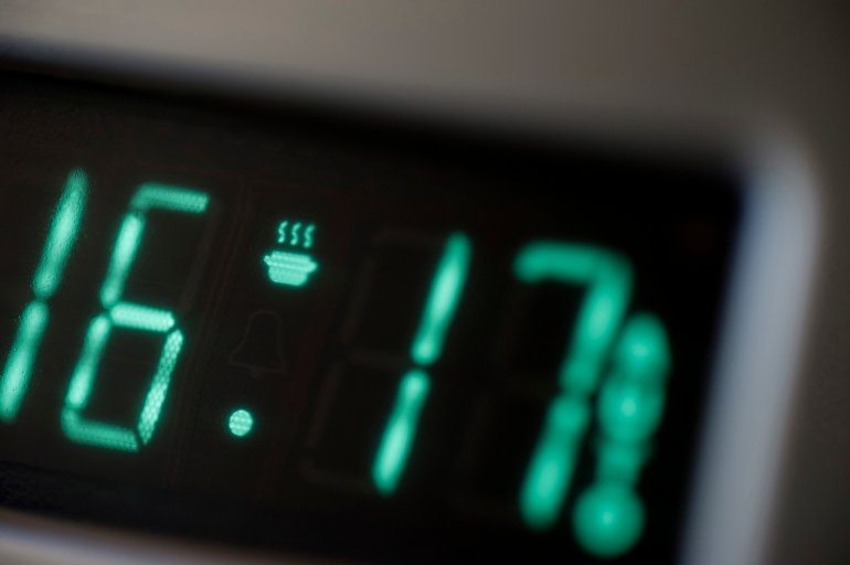 Timer on an electric oven Close up view of the digital readout and display on the timer on an electric oven