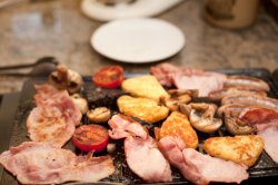 hearty English breakfast on a griddle