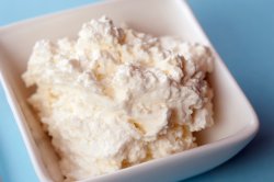Dish of fresh cottage cheese
