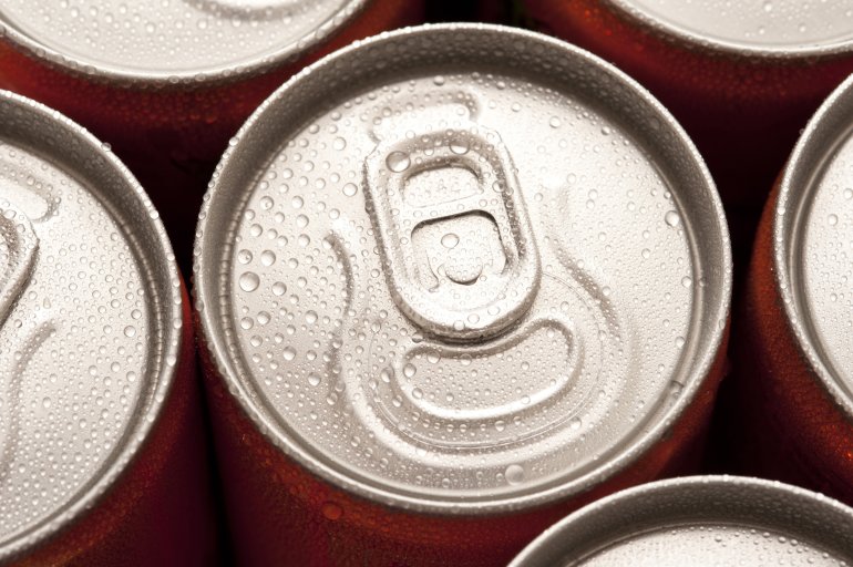 Ring pull on a can of cold soda Close up view of the ring pull on a can of cold soda or soft drink with moisture condensation, high angle view of the lid of the tin