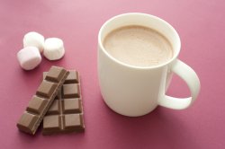 Delicious hot chocolate drink with ingredients