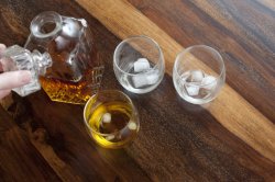 Man opening a decanter