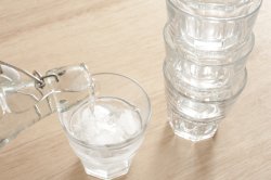 Pouring a glass of fresh pure water
