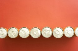 High Angle View of Soda Cans in a Row