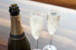 Two flutes of sparkling champagne