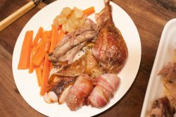 Tasty roast turkey dinner with pigs in blankets