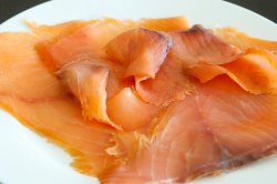 Dish of thinly sliced smoked salmon
