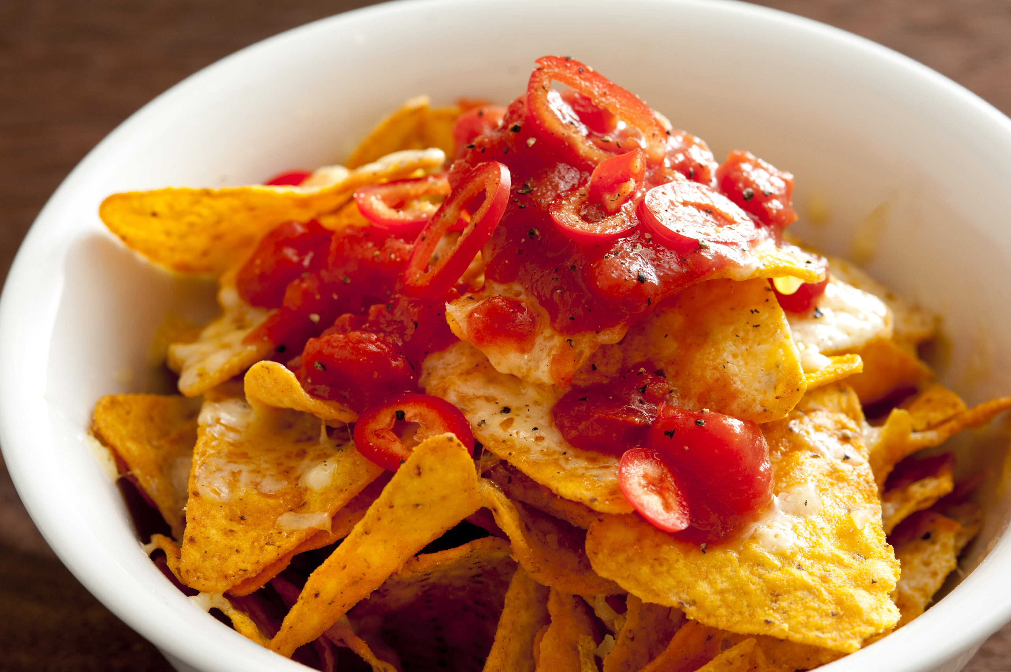 Hot spicy salsa on tortilla chips - Free Stock Image
